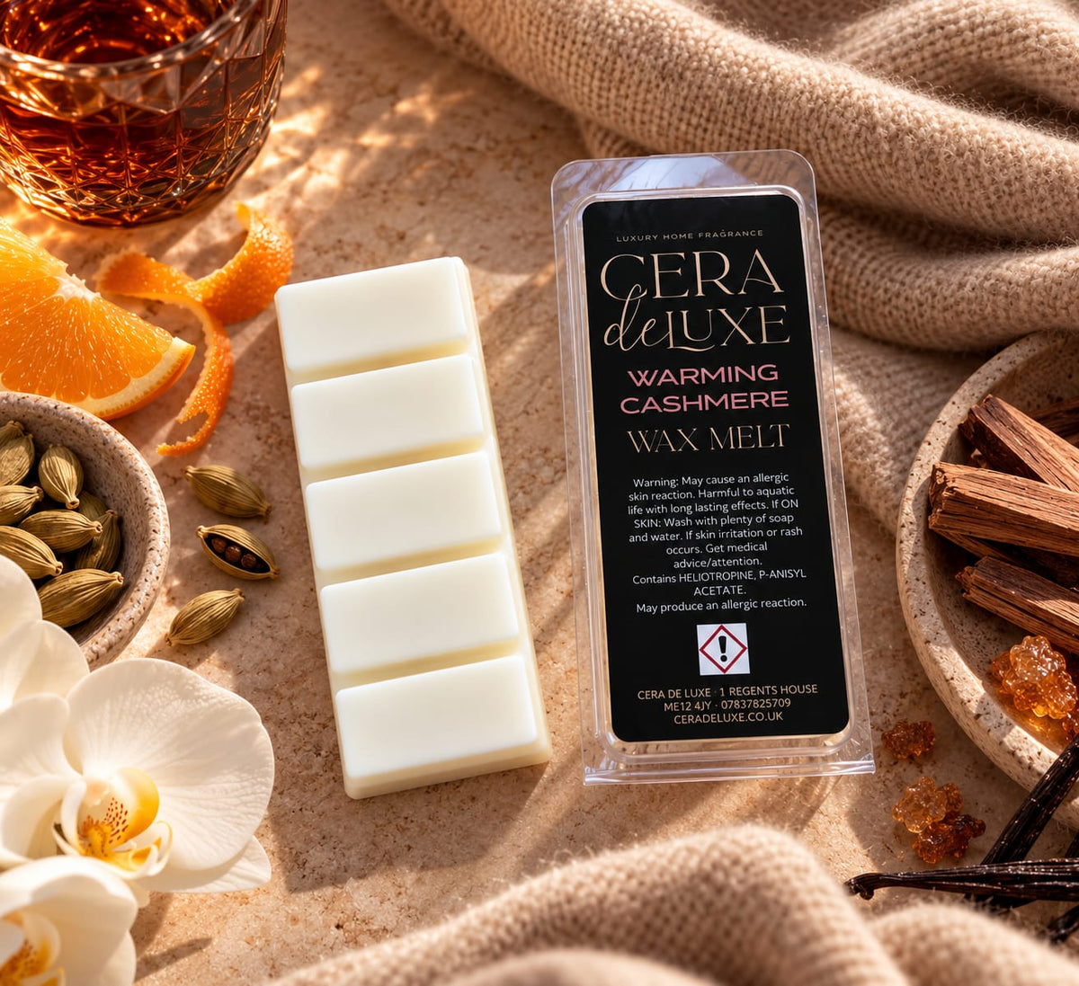 Warming Cashmere luxury wax melt styled with orange, cardamom, amber, vanilla and a soft cosy cashmere blanket
